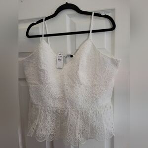 Eyelet peplum tank
